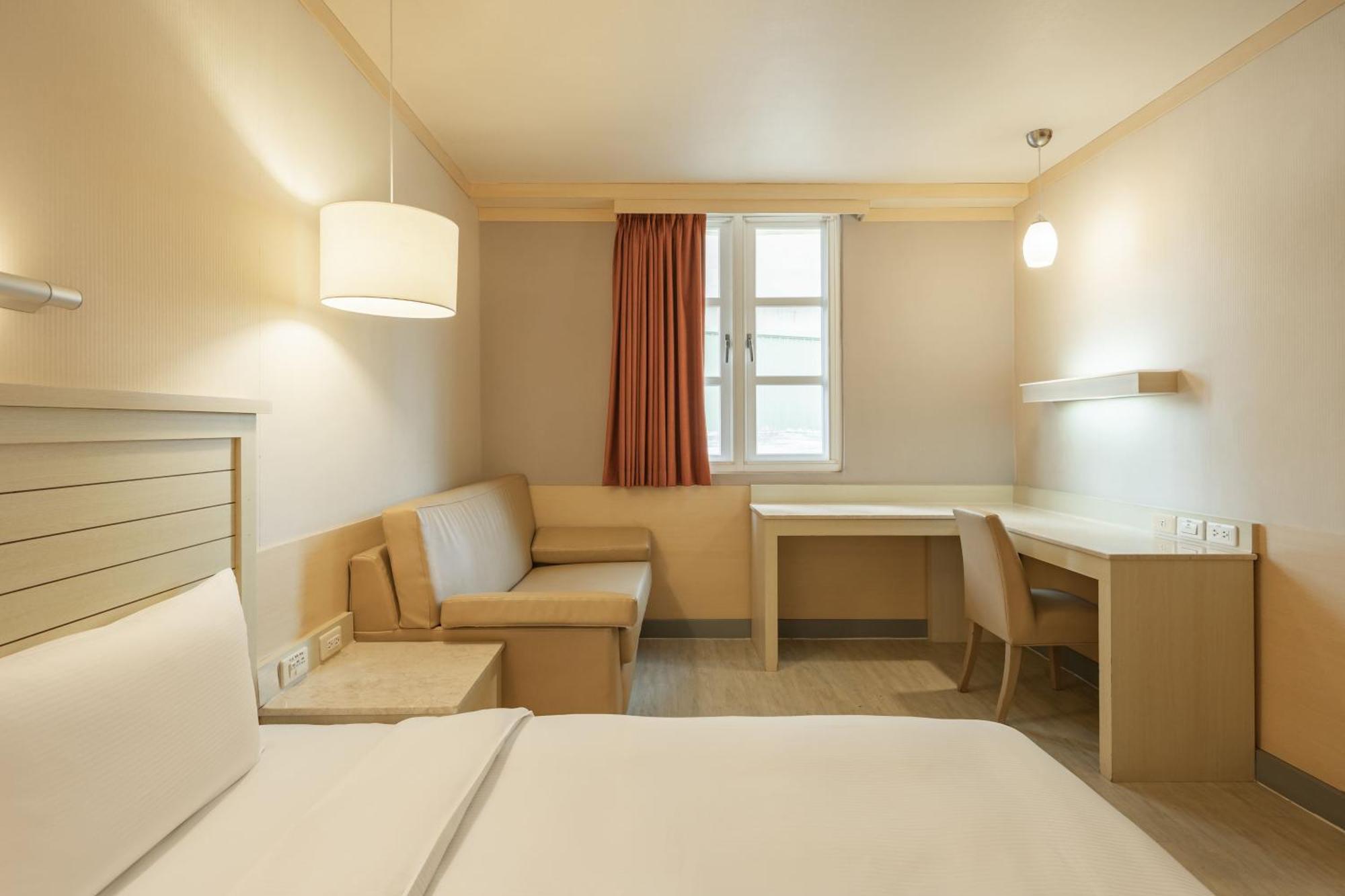 Kindness Hotel - Jhong Jheng Kaohsziung Szoba fotó